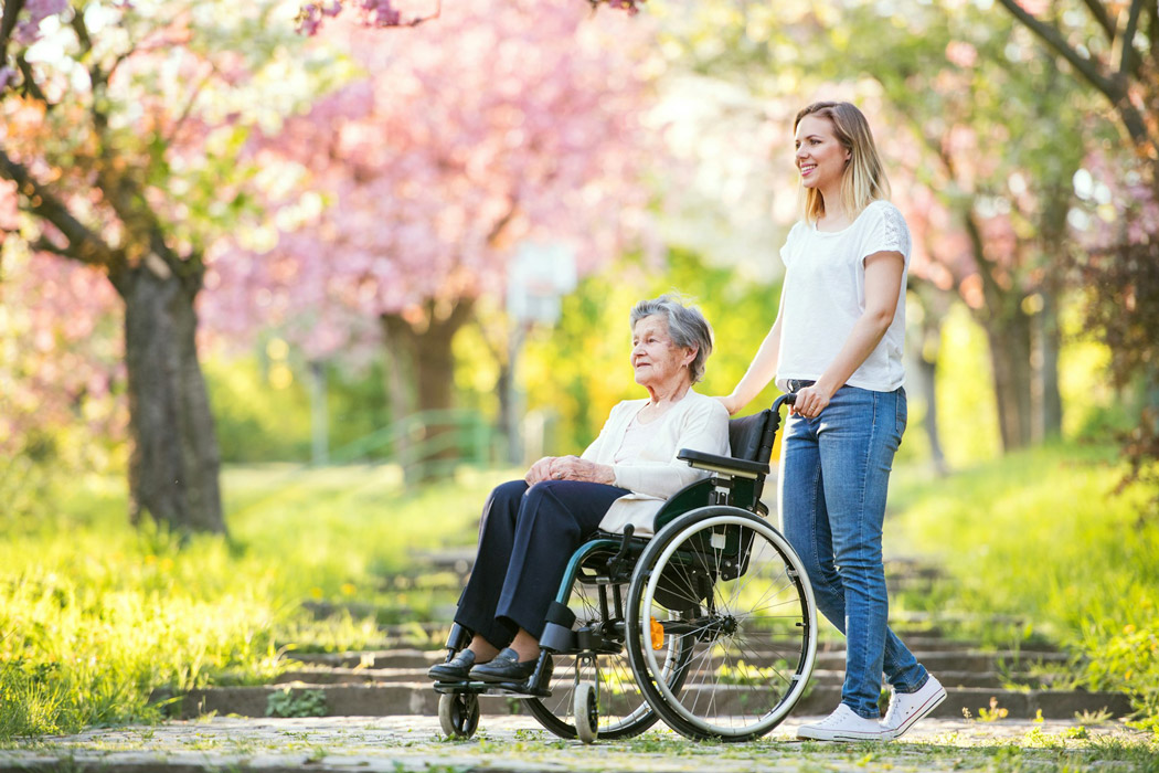 Outdoor elder wheelchair caregiver
